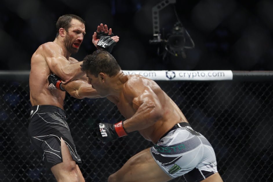 UFC free war: Paulo Costa outslugs Luke Rockhold in wild War of the Night