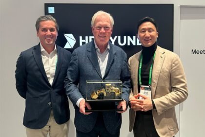 Kisun Chung, Vice Chairman of HD Hyundai, Provides A Golden Loader Award to NED High Executives Right through CES Conceal in Las Vegas