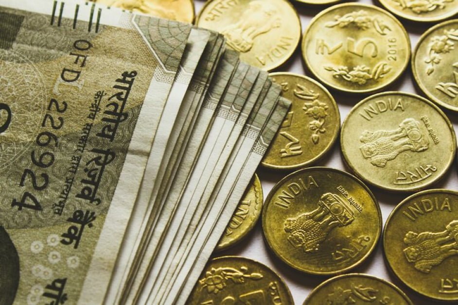 USD/INR depreciates as Indian Rupee receives increase on index inclusion